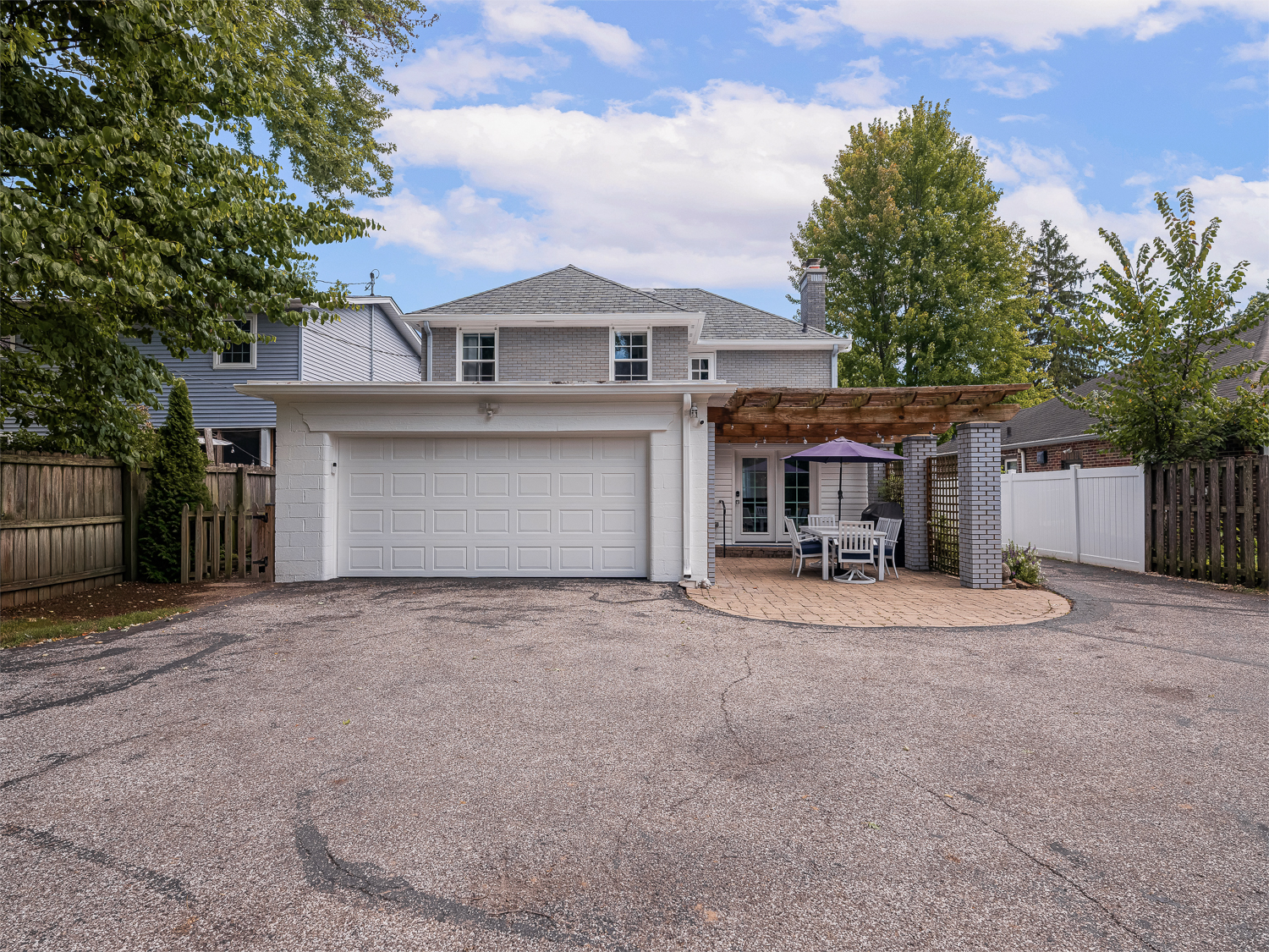 DRIVEWAY PARKING + GARAGE (ROOM FOR 1 CAR IN GARAGE)