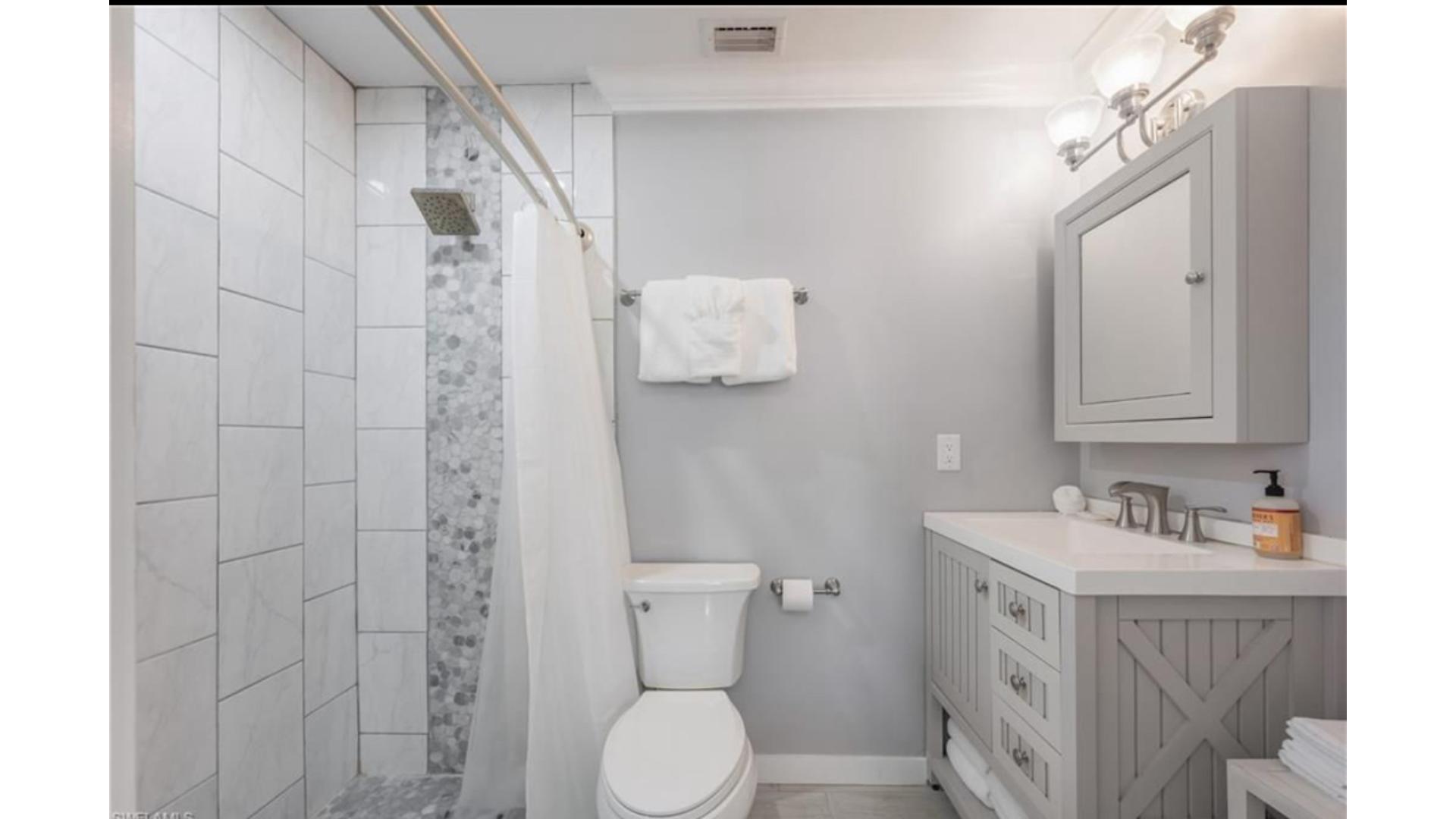 Upper Full Bath Adjacent to Bedroom 1