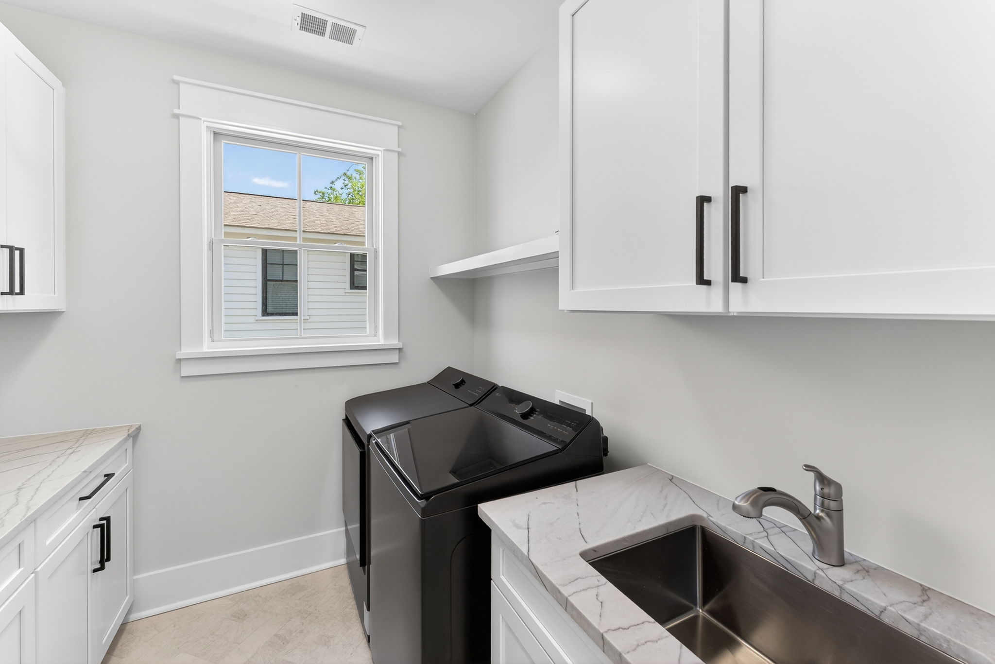 Laundry Room | On Beach Time | 6 30th Ave, Isle of Palms, SC | IOP Escapes