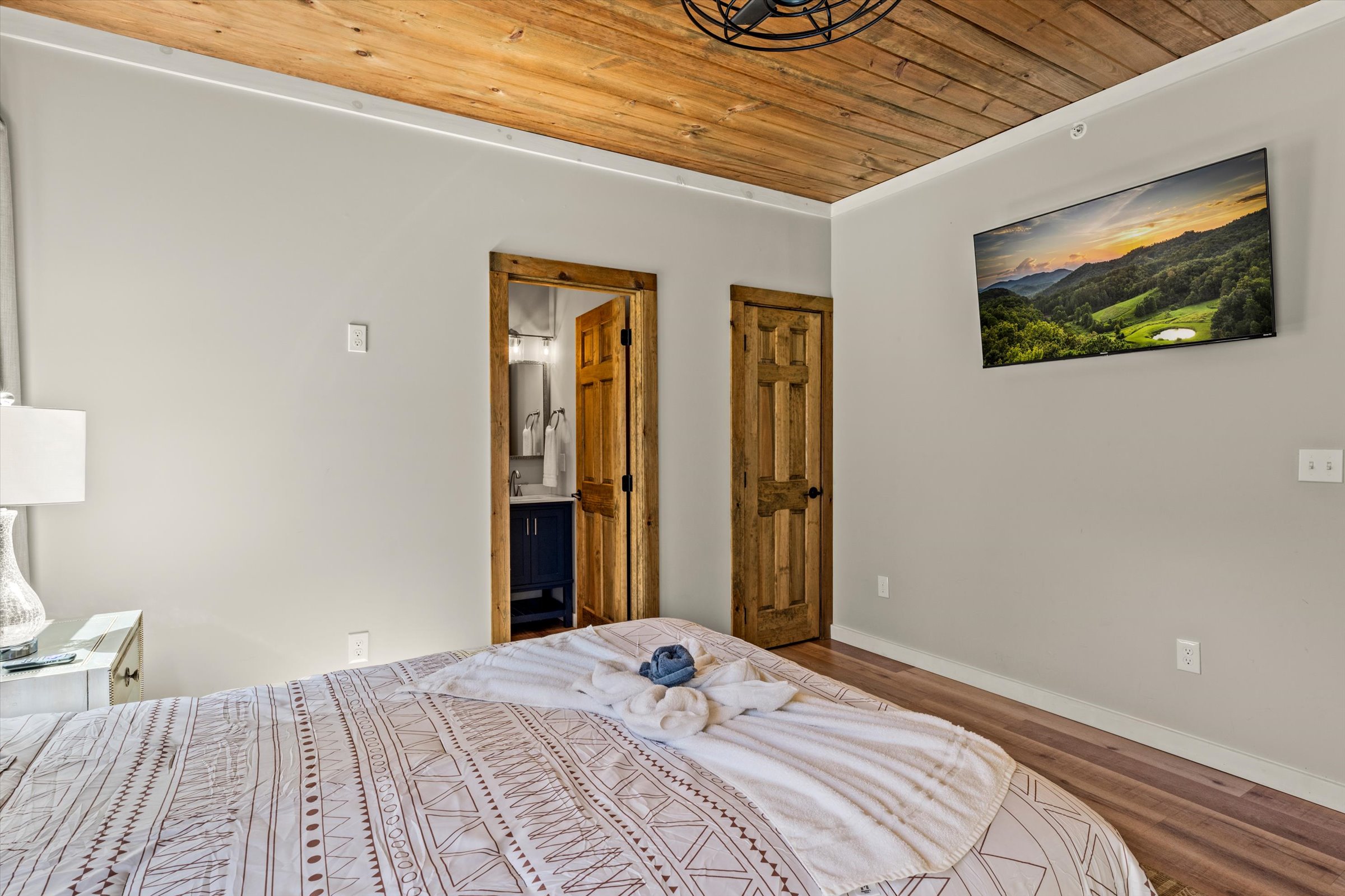 The bedroom has a Smart TV , walking closet and an attached full bathroom.