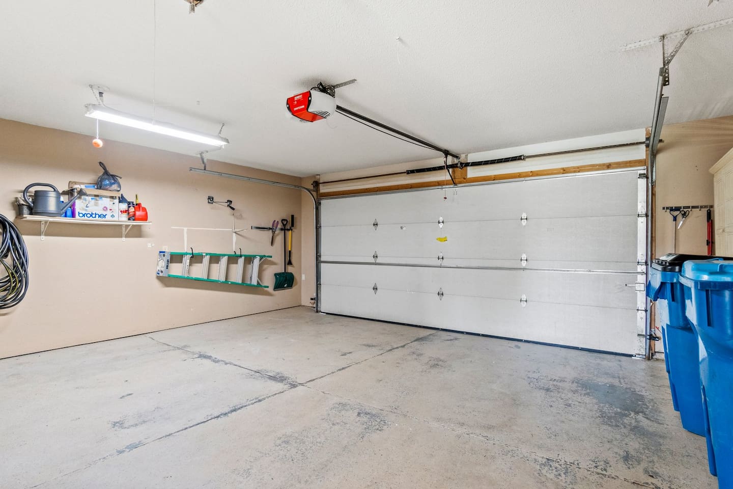 Spacious 2-Car Garage – Features convenient shelving, ladder storage, essential tools throughout your stay!
