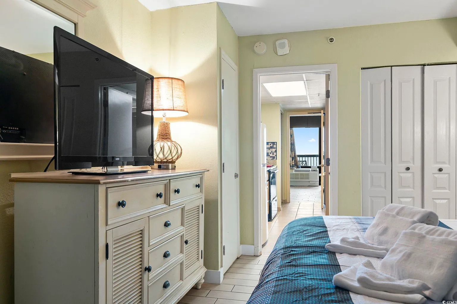 Relax in comfort with soft linens and a calm coastal vibe