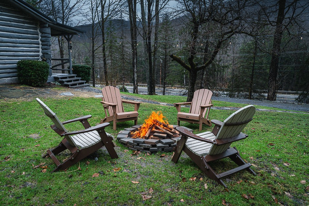 Unwind under the trees at Denton Hill Hideaway 🔥 Four Adirondack chairs circle the crackling firepit—perfect for late-night stories, stargazing, and soaking in the peaceful mountain air.