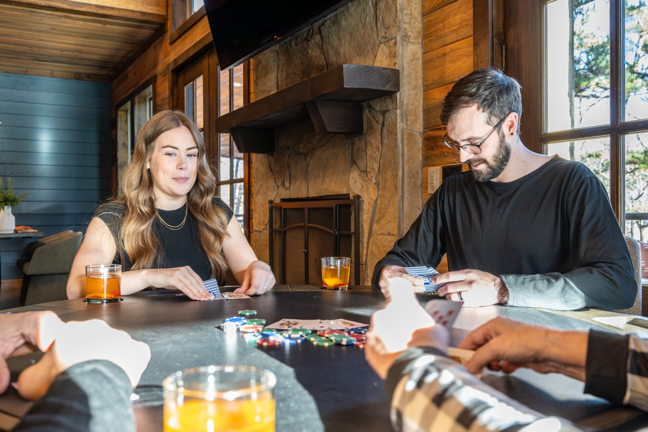 Entertainment Hub: Gather around the game table with friends, laughter, and drinks in this inviting space!