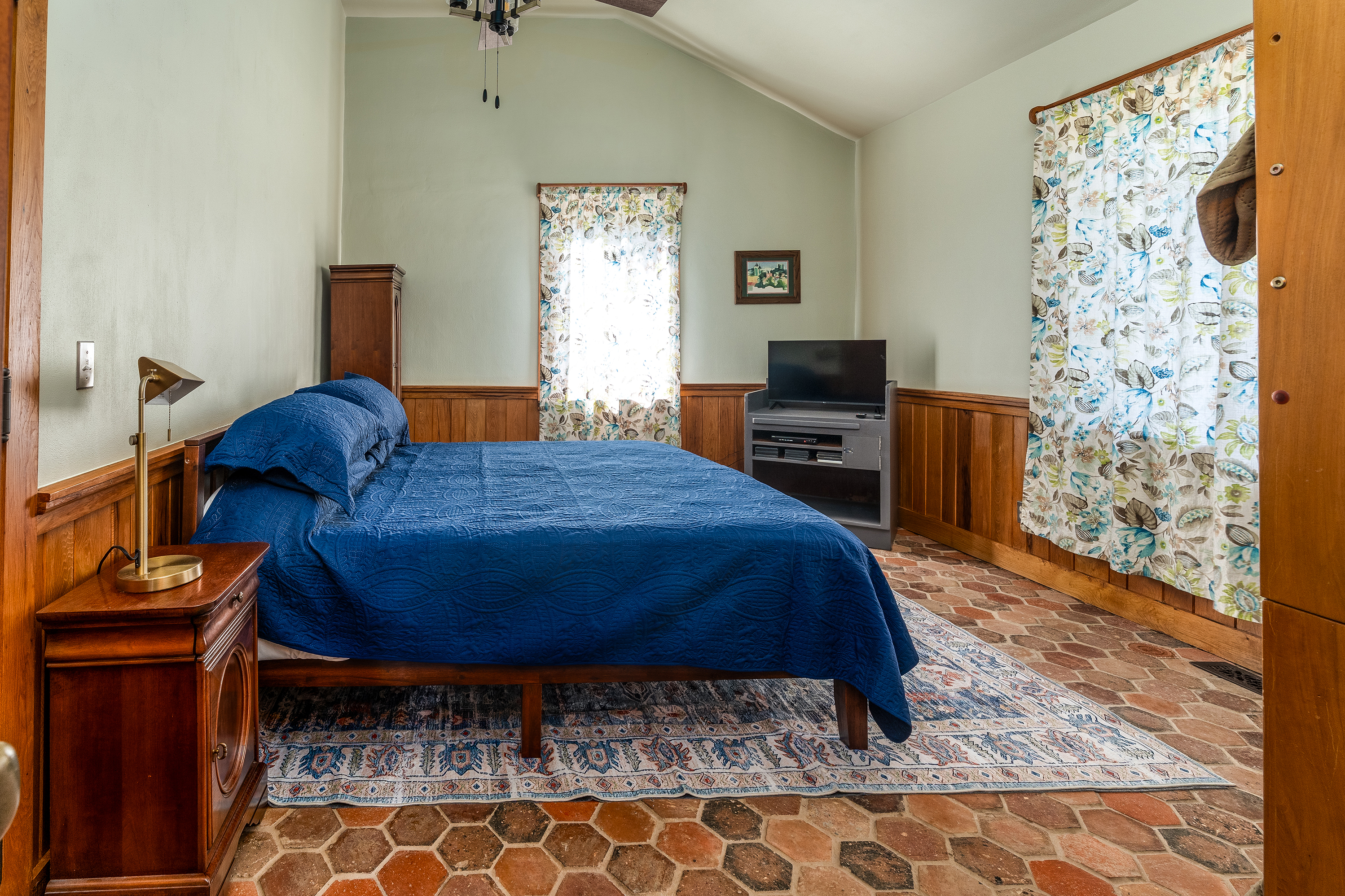 Bright, airy bedroom designed for relaxation and a good night’s sleep.