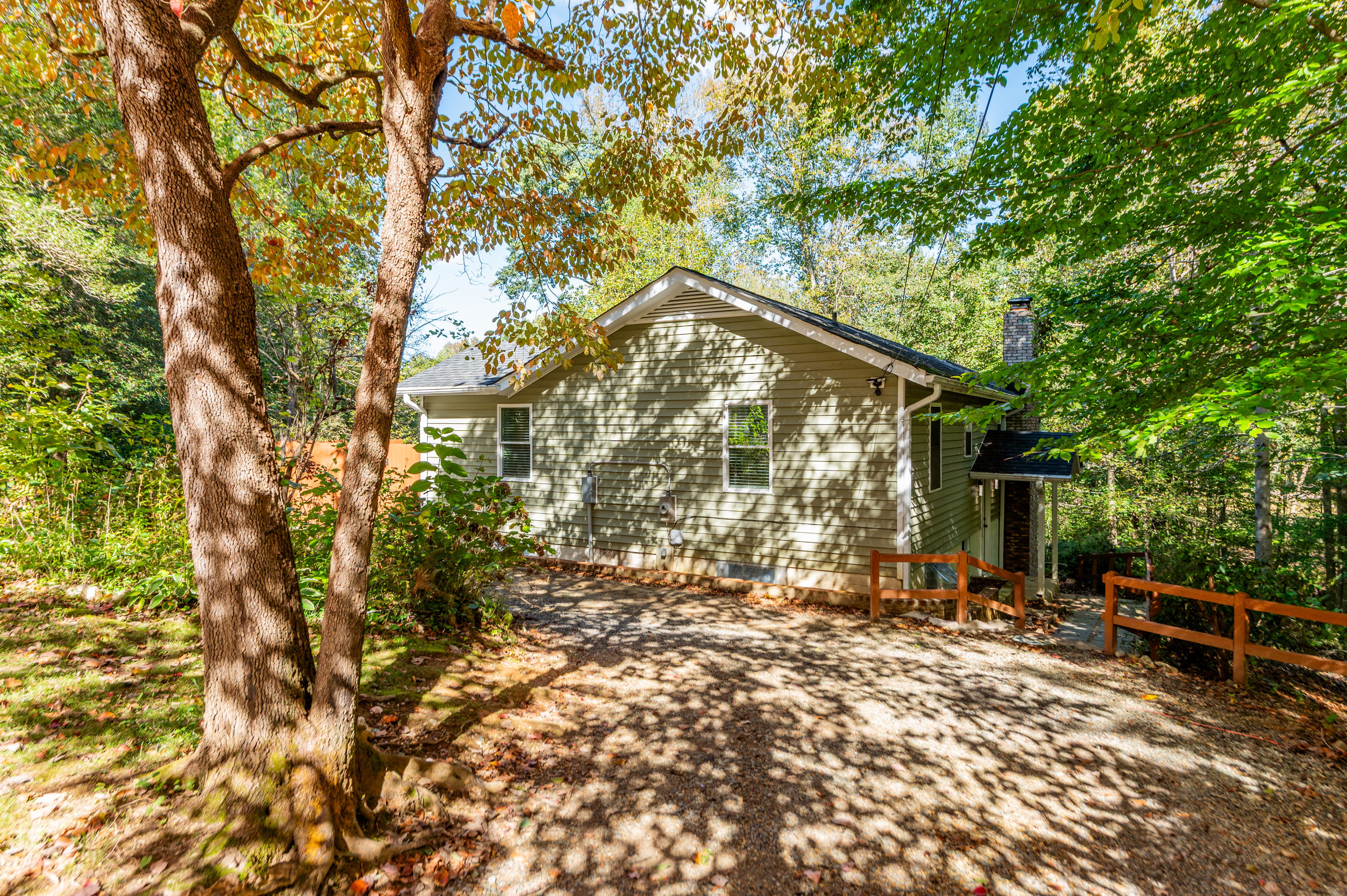 Exterior: Nestled among trees, this home offers serene views and easy access to nature!