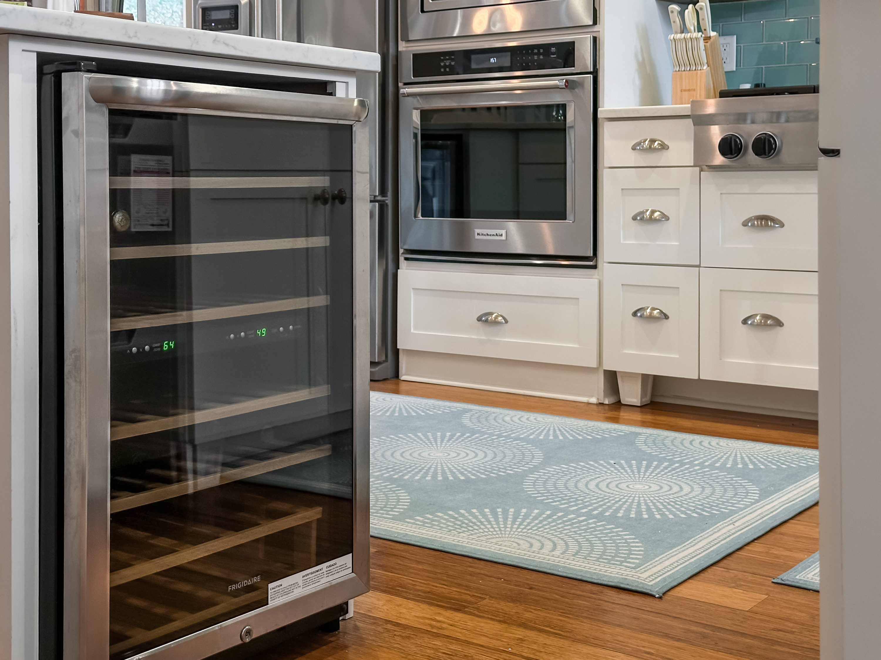 The two mini fridges at either end of the island provide extra space for drinks and snacks.