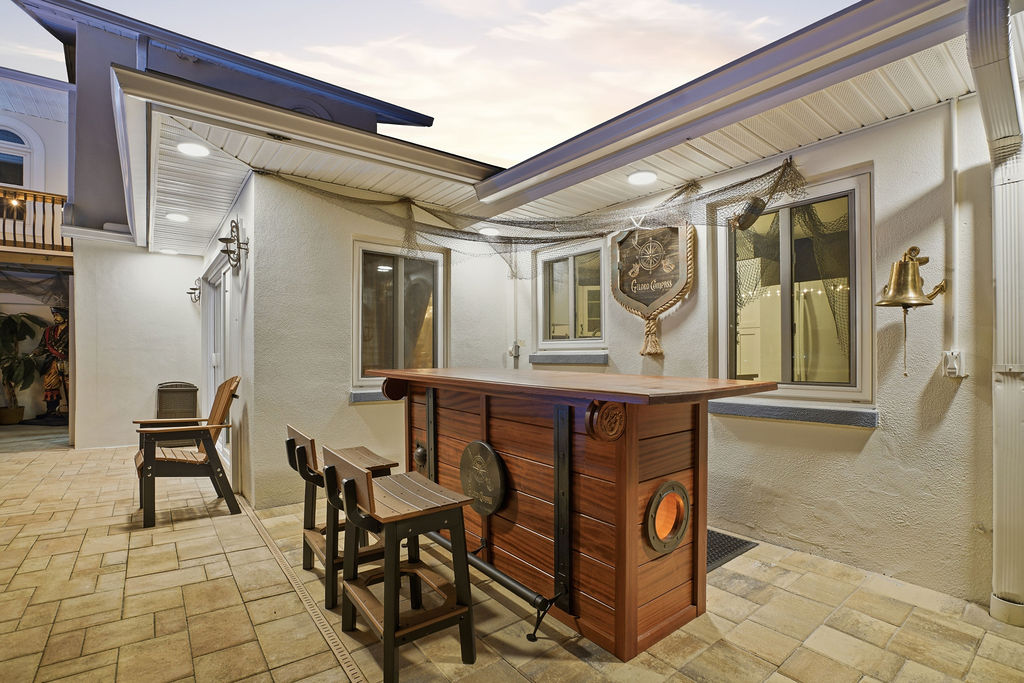 The Gilded Compass Bar — where pirates sip, kids giggle, and everyone behaves… mostly.