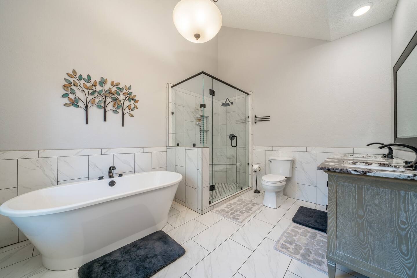 Relax in our amazing soaking tub or experience an incredible walk in shower.  We provide shampoo and body wash and nice soft towels. -Master Bathroom
