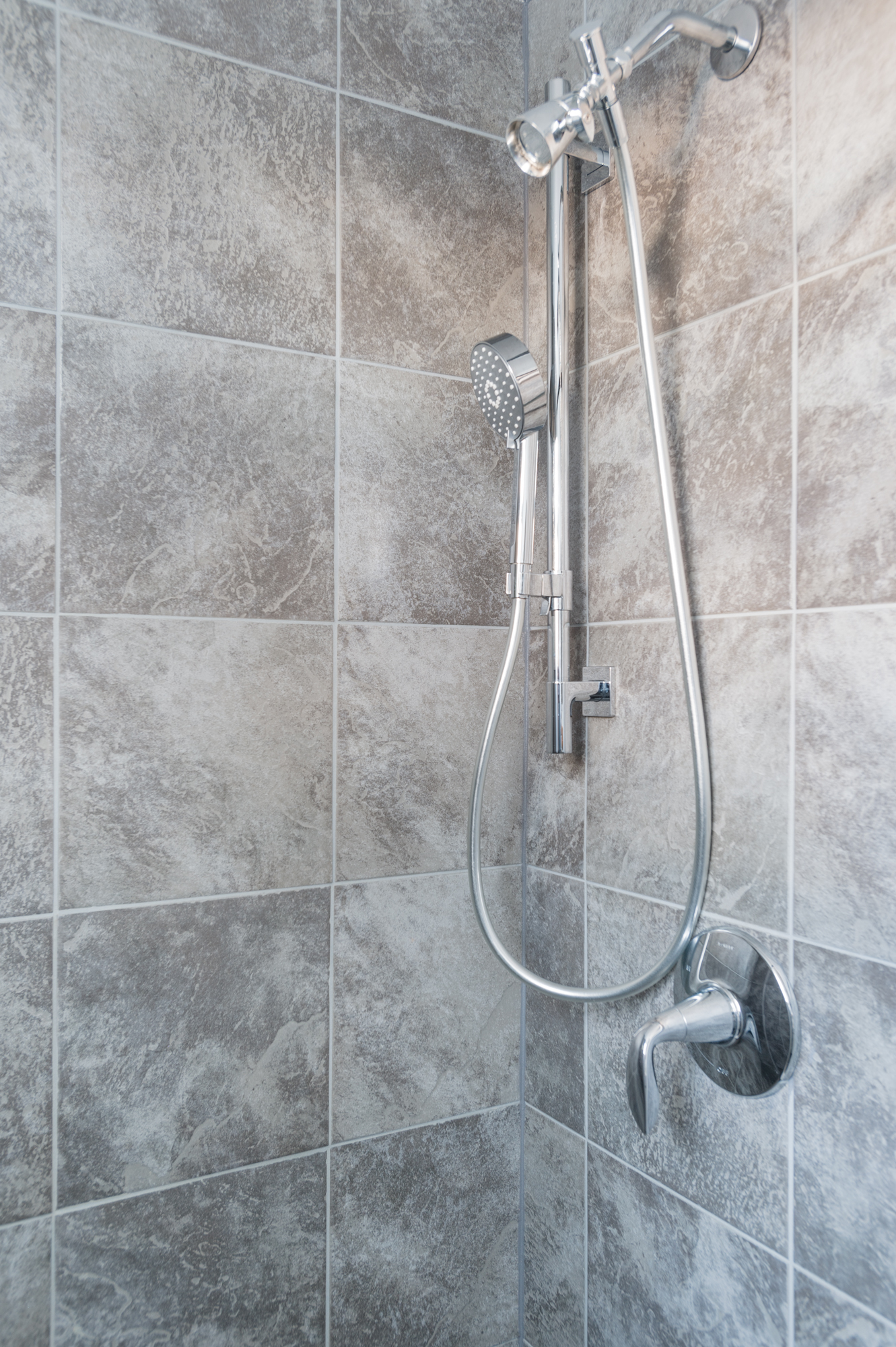 The shower in the upstairs bathroom