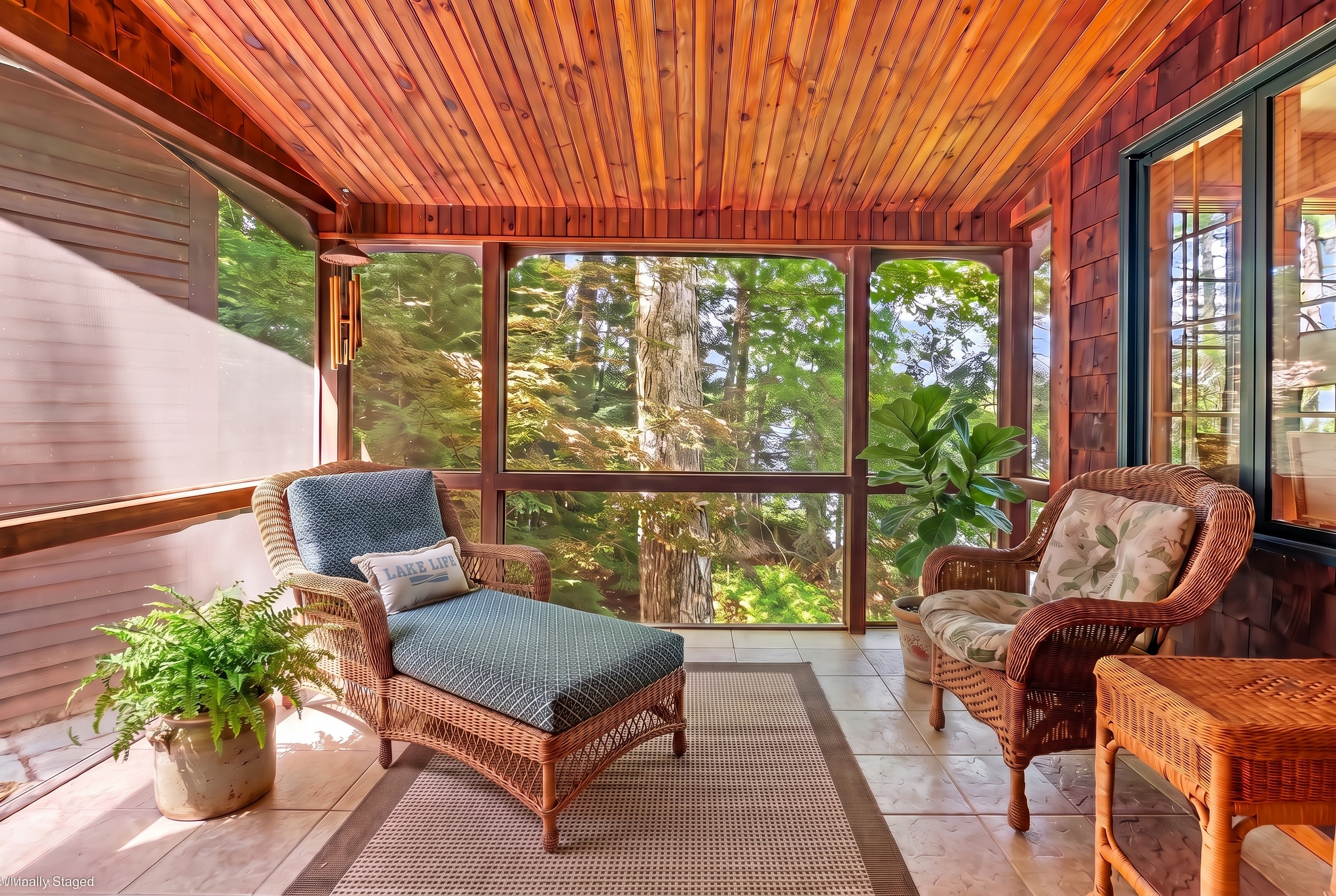 All season porch with beautiful view of the lake. 