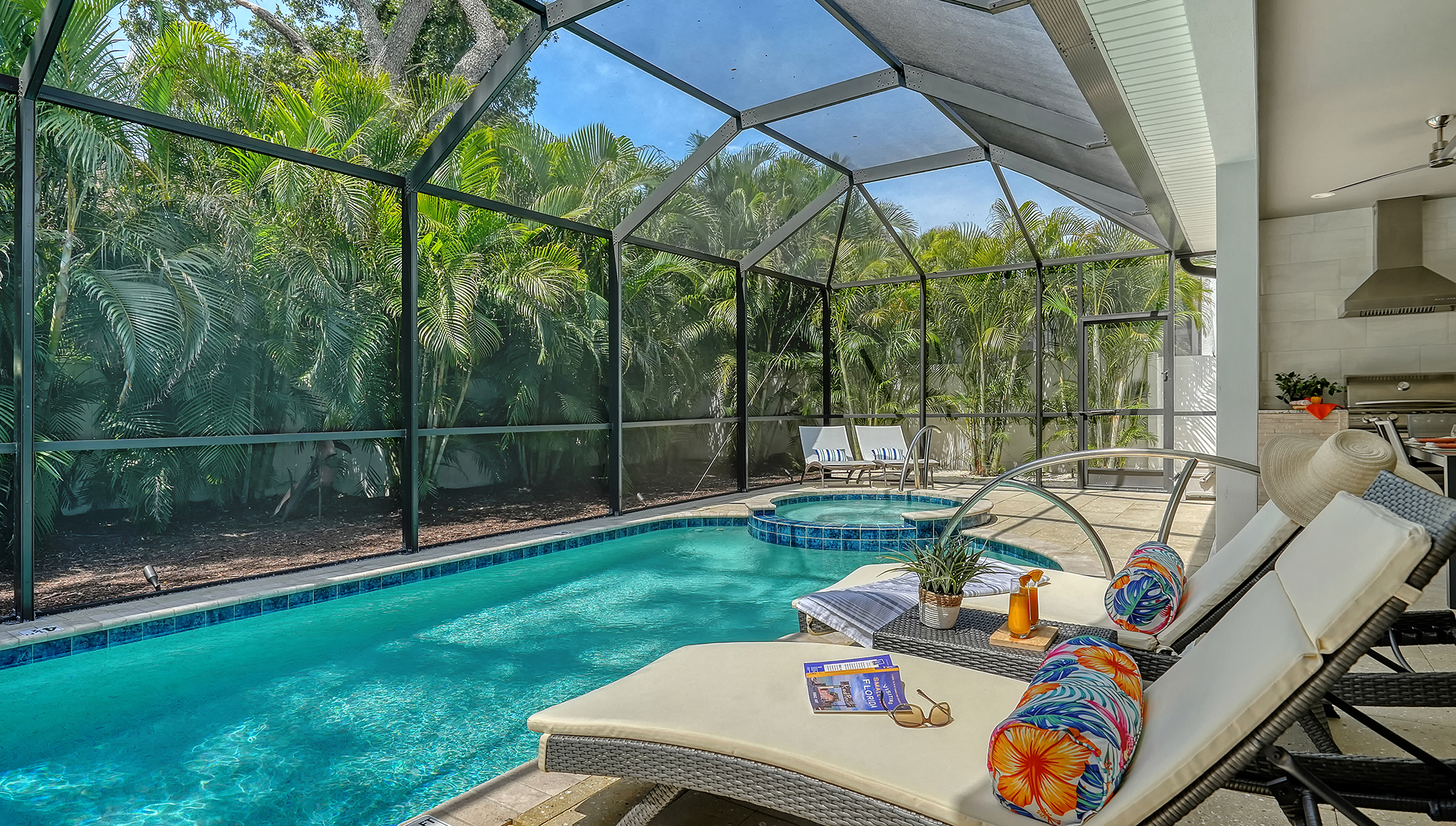 A truly private pool retreat surrounded by lush tropical palms, with a heated pool Oct–Apr, 104°F spa and cool-touch tile—just 3 miles to Siesta Key Beach.