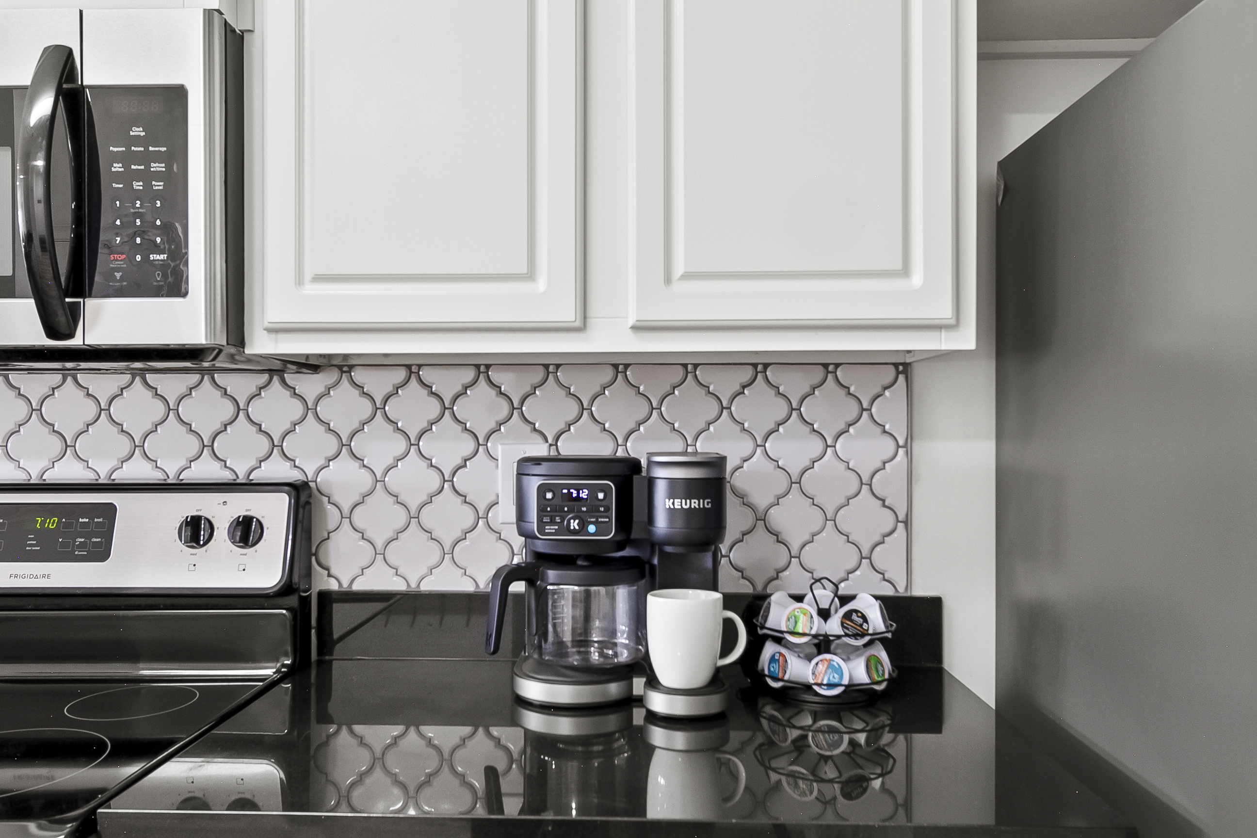 Kitchen Keurig with K-cup and Coffee Pot