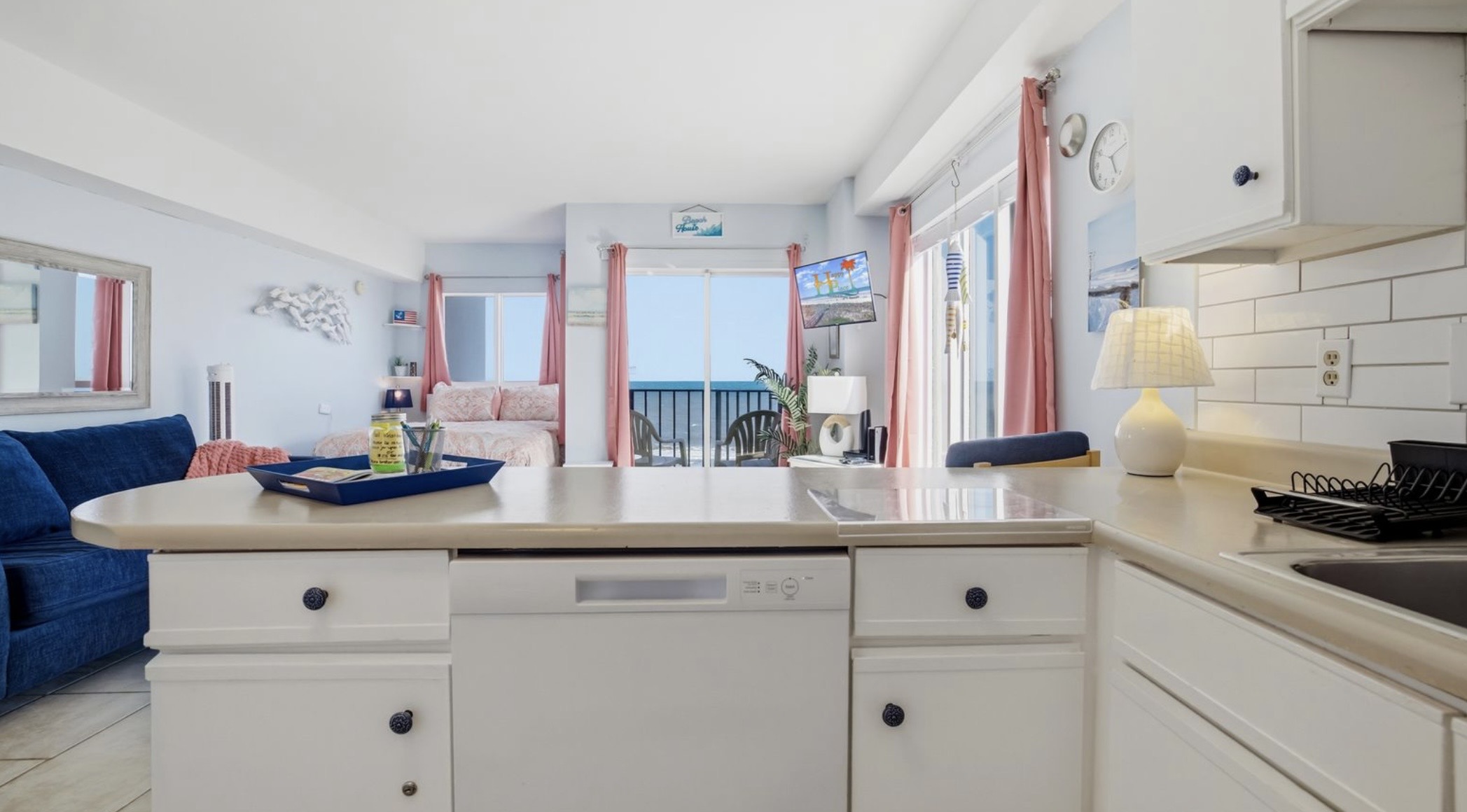 Framed by oceanfront windows, this bright, fully equipped kitchen lets you start the day with coffee and sunrise views — calm, clean, and elevated. ⭐
