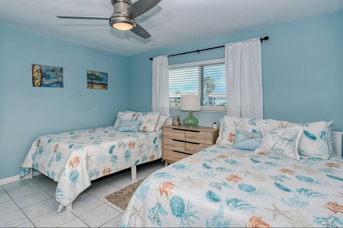 Guest bedroom 2 queen beds and Inlet view