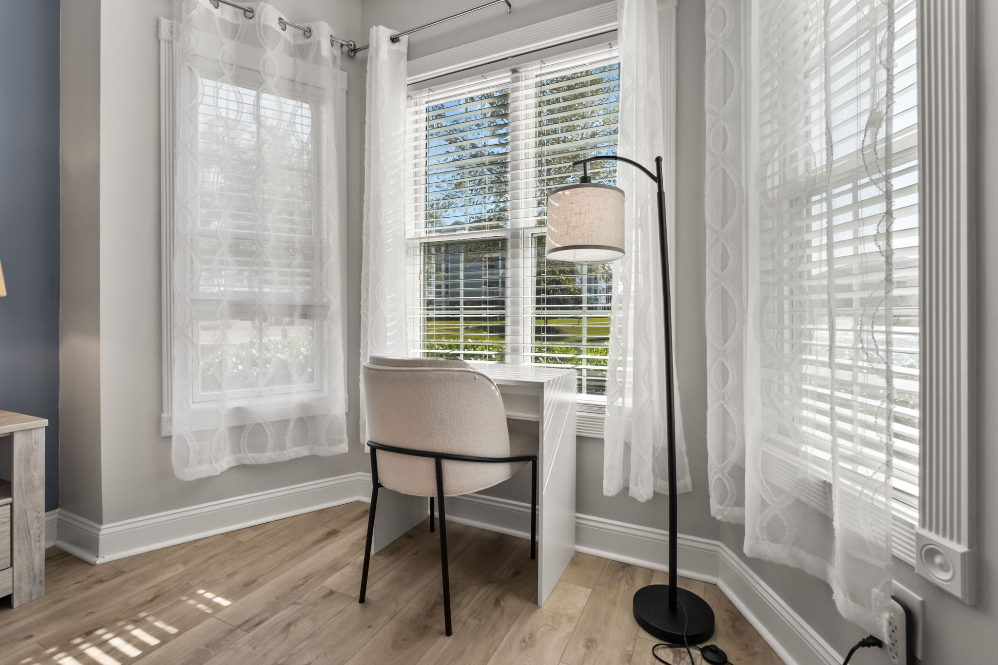 A small study table with a minimalist design, perfect for focused work or study sessions—featuring ample space for essentials and a cozy, inviting vibe.