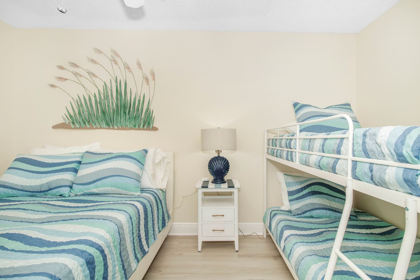 Bedroom 2: Queen & twin bunk beds, sleeps 4.