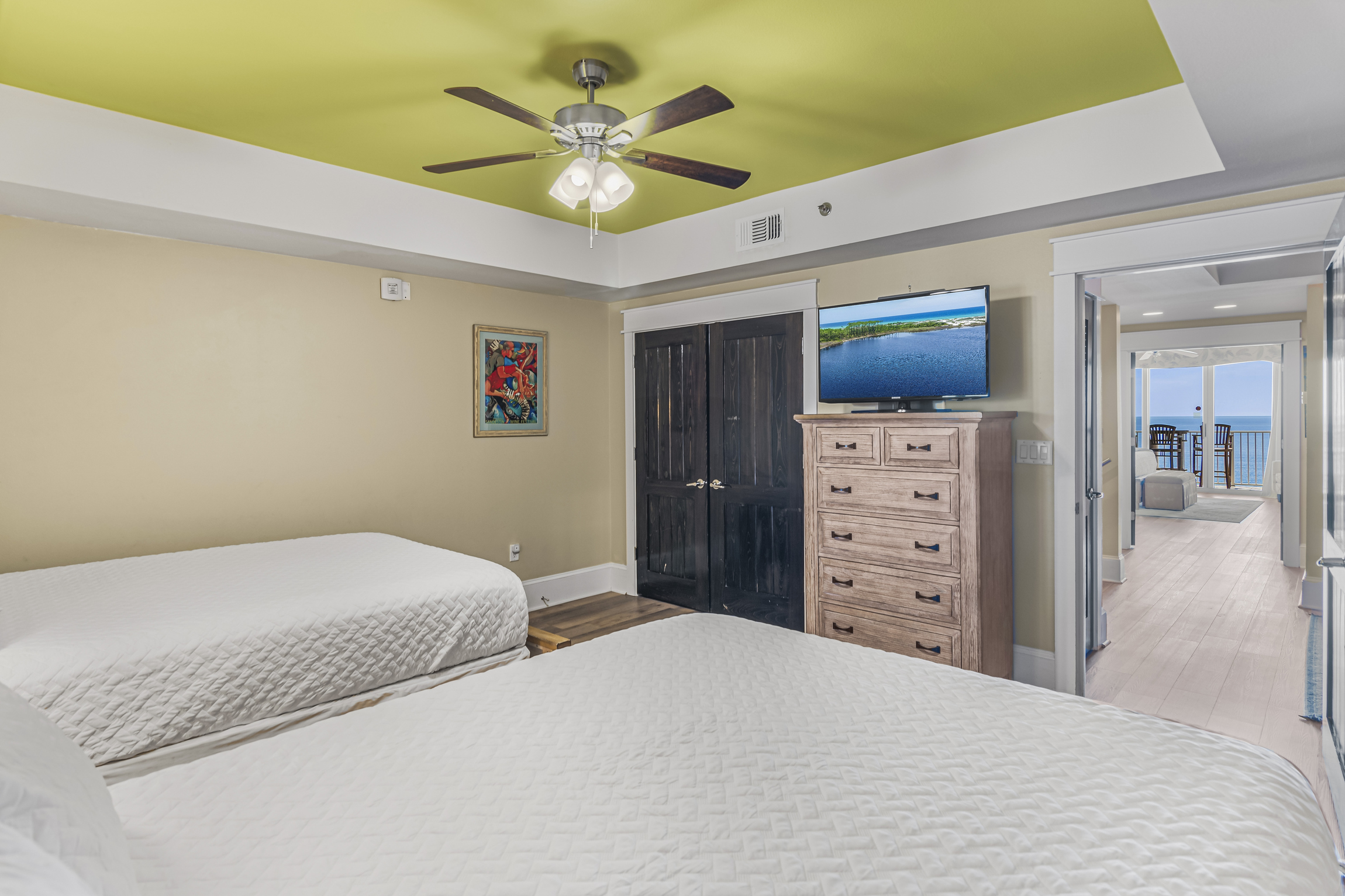 2nd Floor Guest Bedroom 1: TWO QUEEN BEDS, Smart TV, closet shared bathroom with Guest Bedroom #2 with dual vanity, shower/tub combo (sleeps 4)