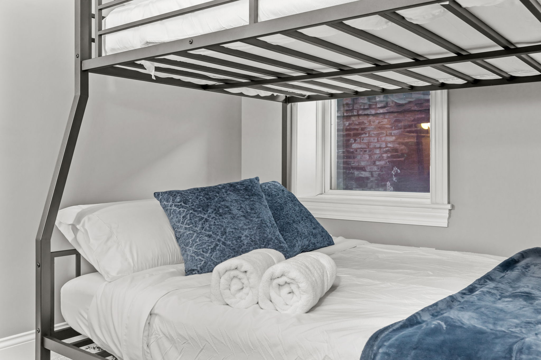 Queen size on bottom, Full XL on top! No one has to feel cramped. (Use caution when climbing the ladder!)