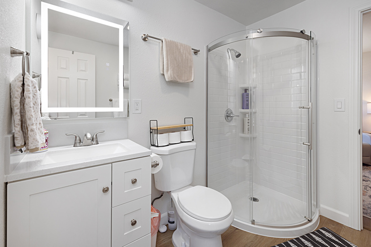 En suite Bathroom #3, attached to Bedroom #4, second entrance leads to family room