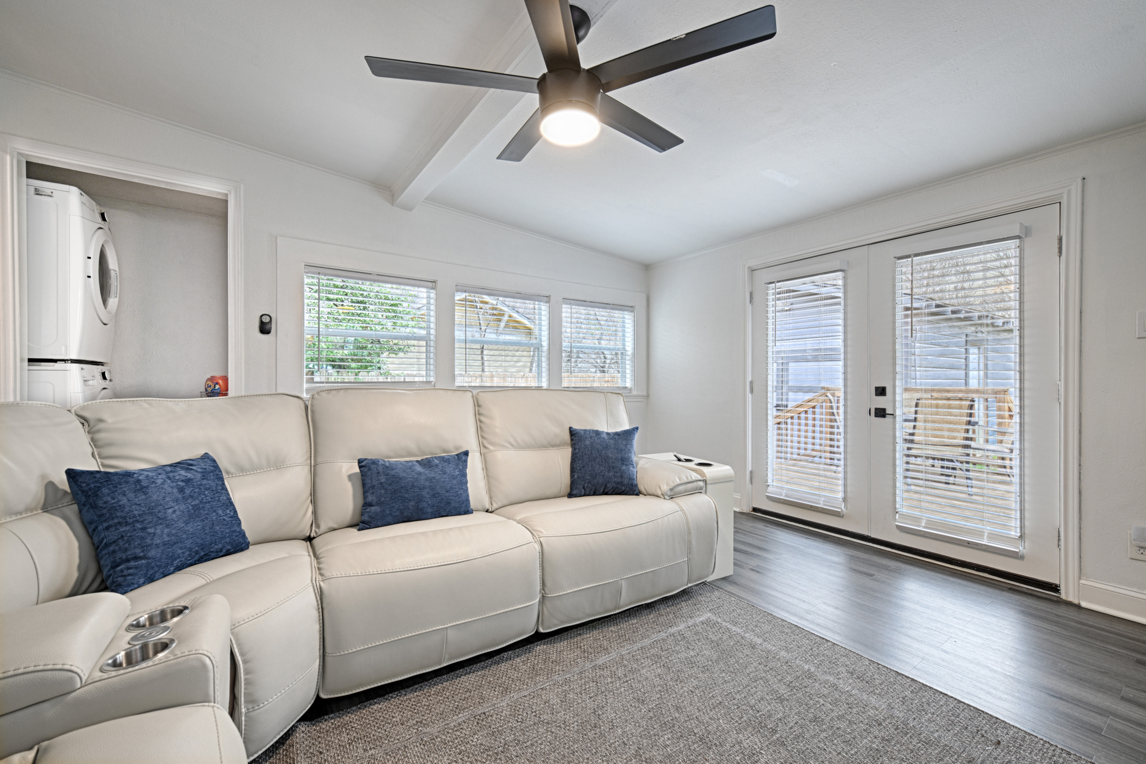 Living Room with Sectional and Large Screen TV
