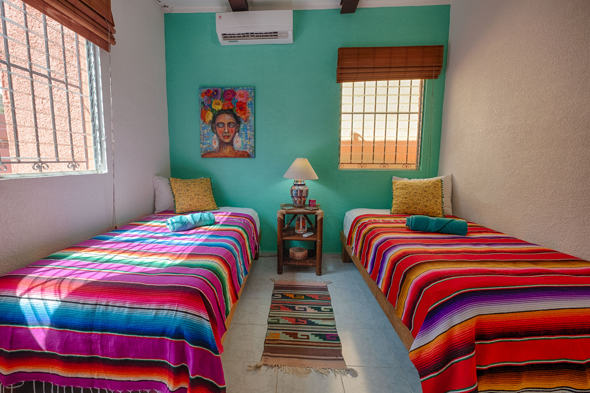 Second bedroom with twin beds, separate a/c unit and ceiling fan. Built-in hammock hooks if you want to sleep Mayan-style.