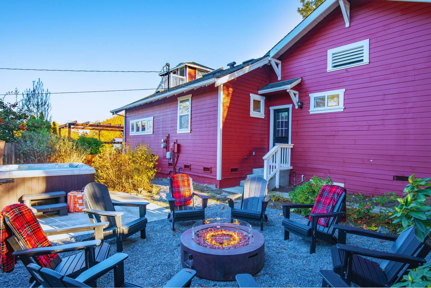 Relaxation central: our fire pit and hot tub duo!