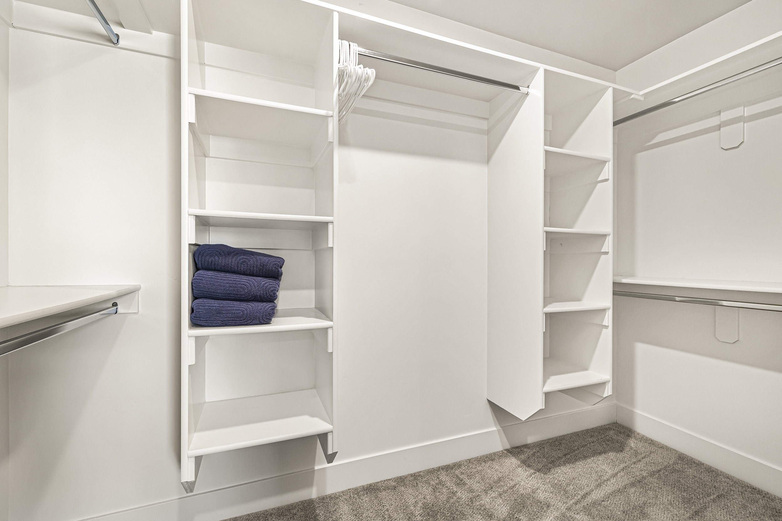 Master bedroom walk-in closet with tons of space and storage.
