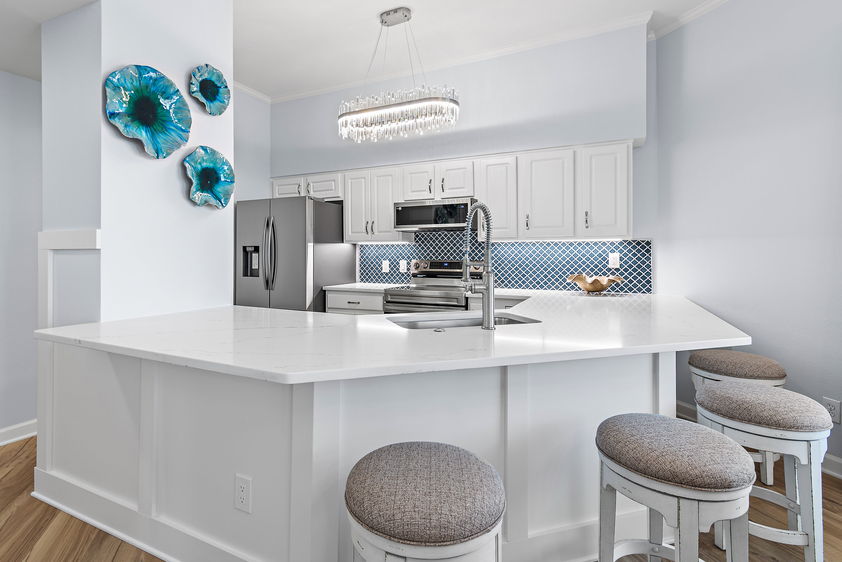 Stainless steel appliances and custom cabinetry