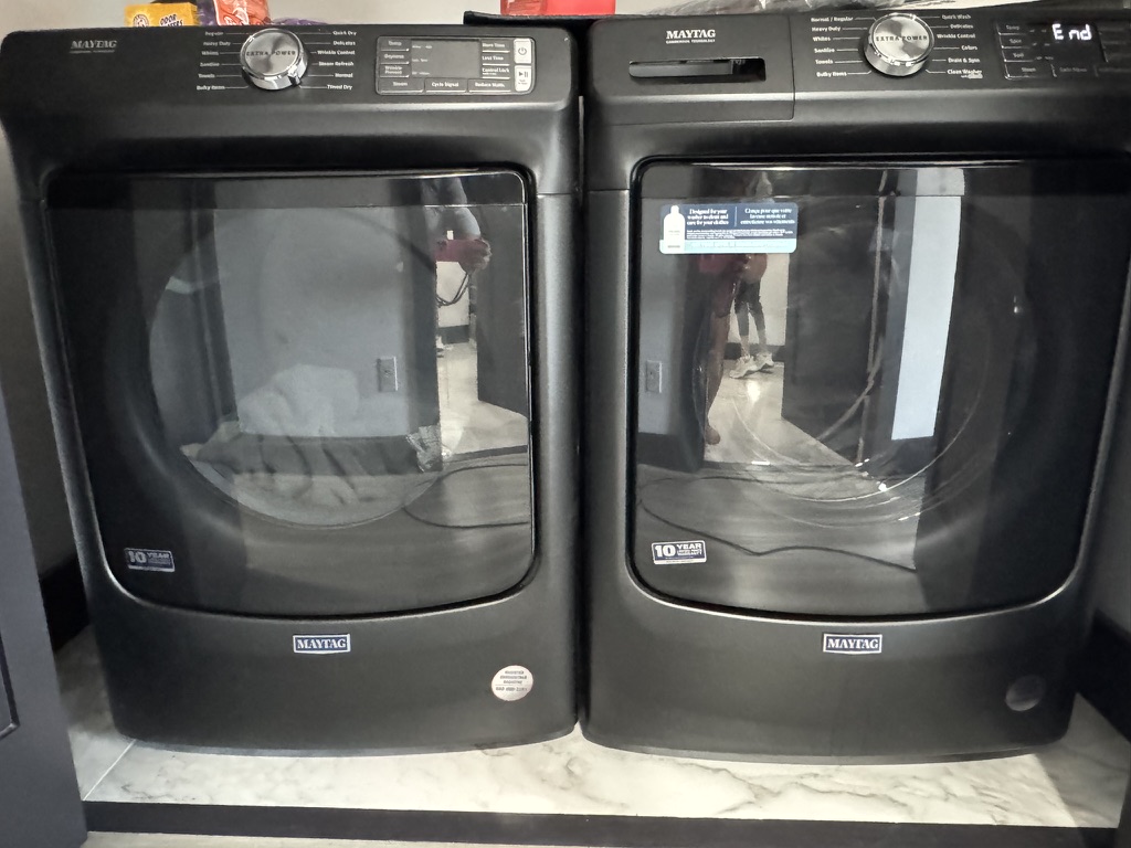 TWO sets of Washer and Dryers, one on each level