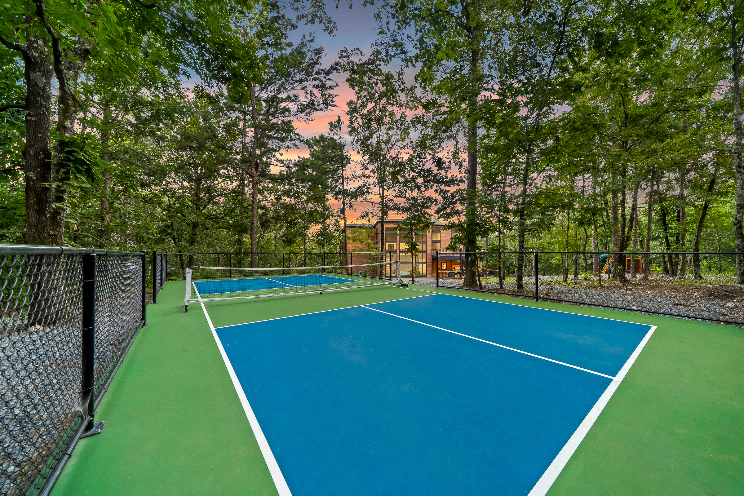 Championship Pickleball Court - surrounded by towering pines