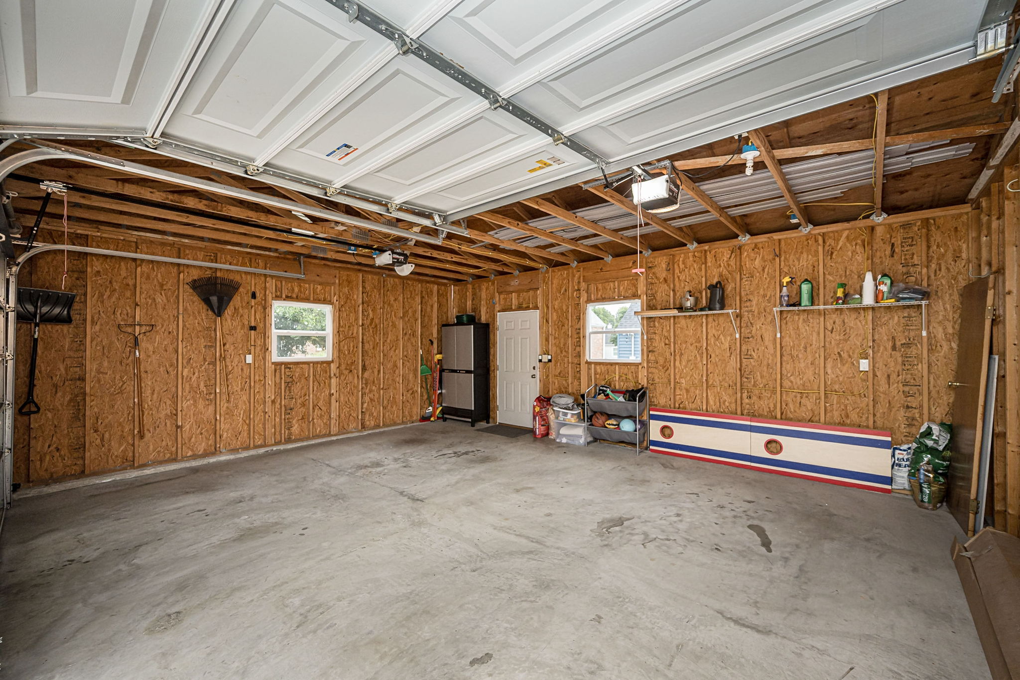 Two-car garage available for guest parking—a rare amenity near Historic Main Street.