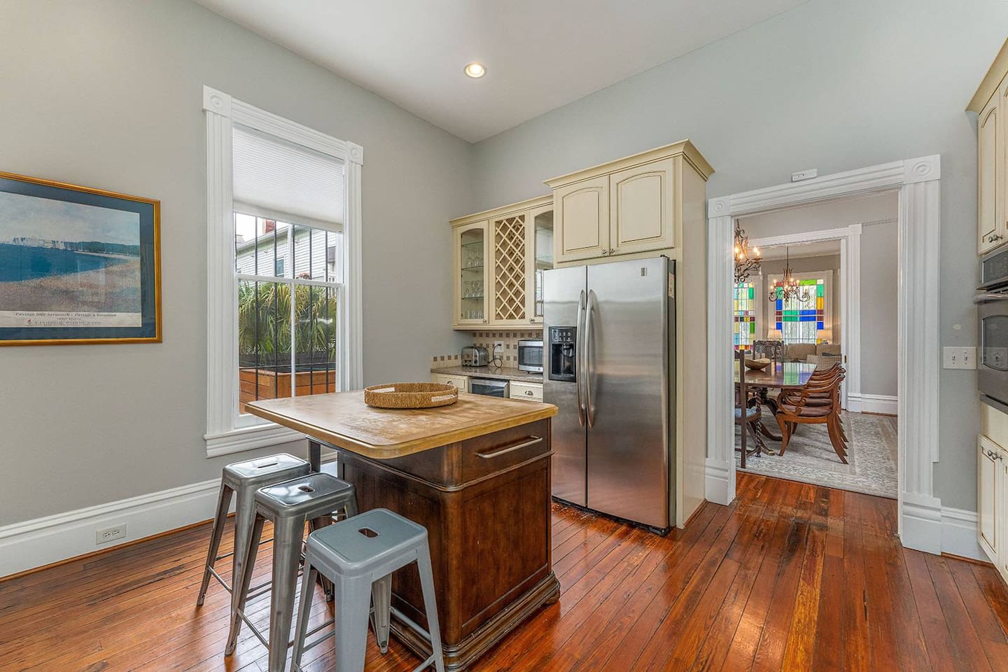 Bright, open kitchen with a new refrigerator (not pictured), wine fridge, and all of the appliances you'd expect in a high-end rental.  Gas stovetop and ample counter space to let the cook in your crew to work his/her magic.