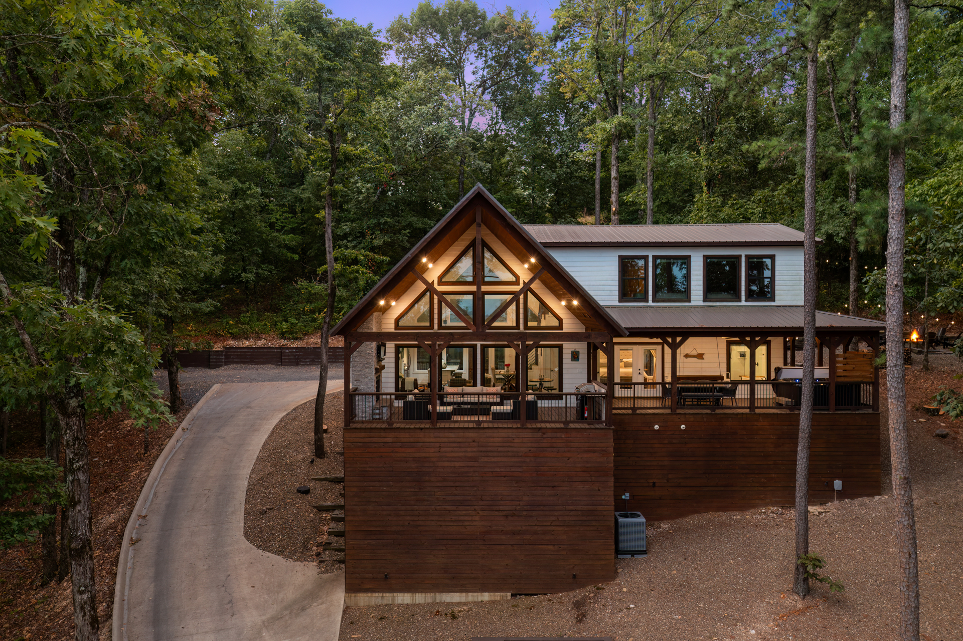 Beautiful modern cabin tucked among the trees with peaceful mountain surroundings