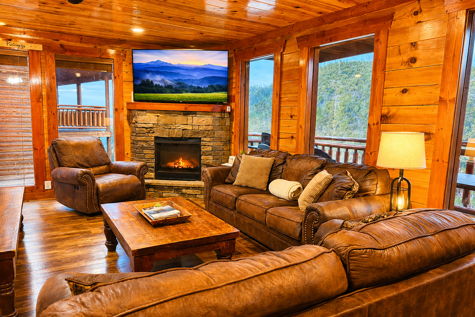 Thoughtful design meets mountain luxury in this inviting family room with cozy seating, a glowing fireplace and mountain views.