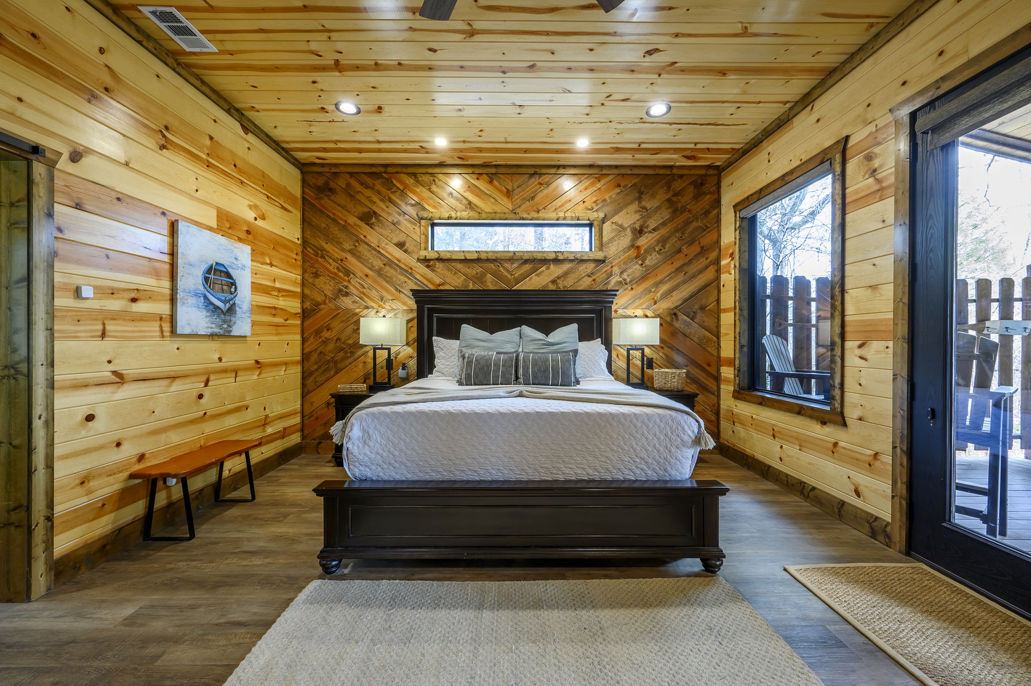 Wake up to serene pond views from your private King Suite—complete with soaking tub and walk-in shower