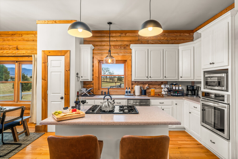 Cook comfortably with ample counter space, plenty of cabinets, and essential kitchen items—ideal for prepping meals, serving drinks, or hosting a group dinner.