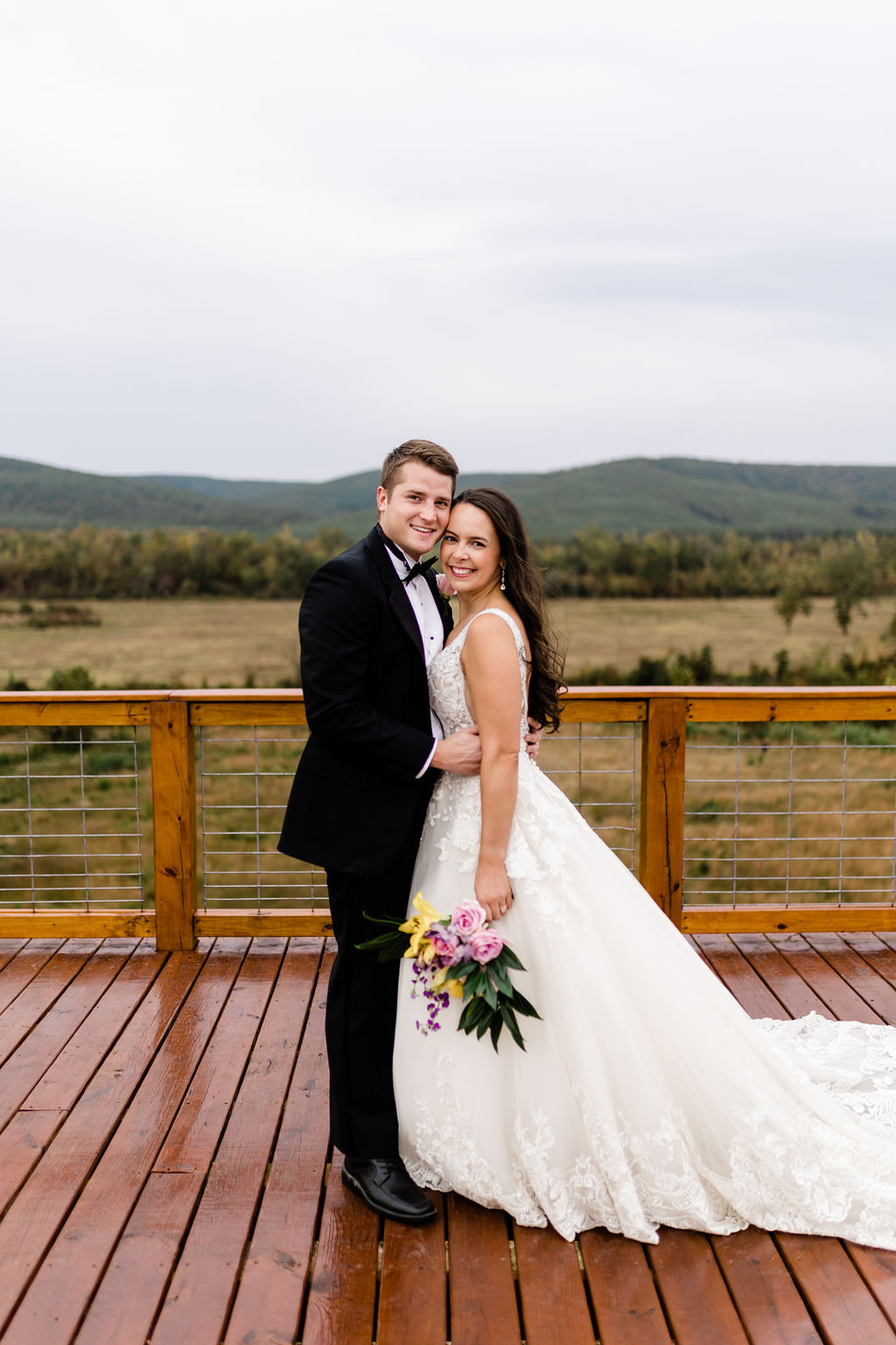 Couple portraits with the Sierra Sky views behind them.