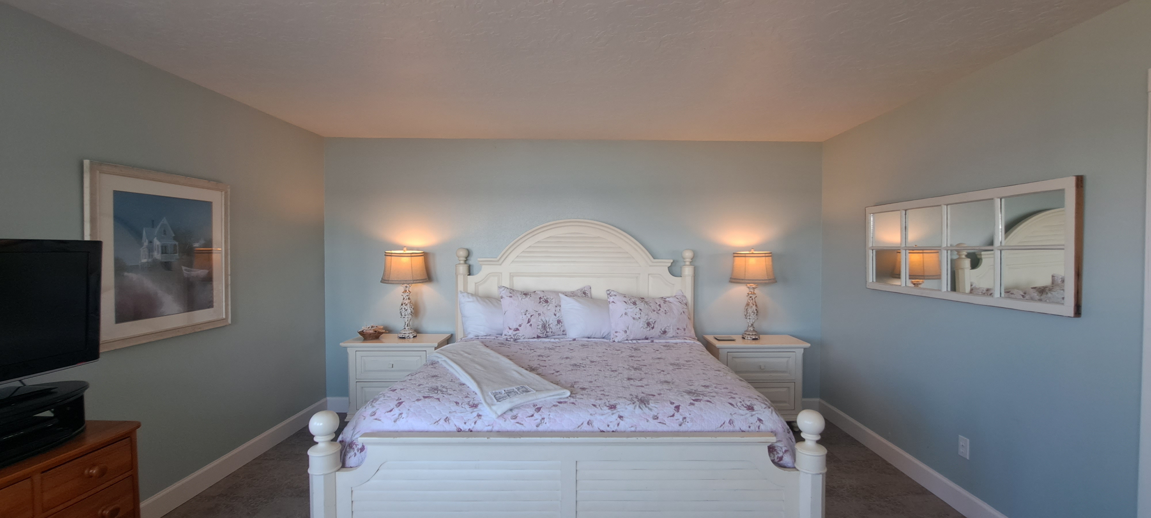 Spacious master suite with a king bed and amazing views.