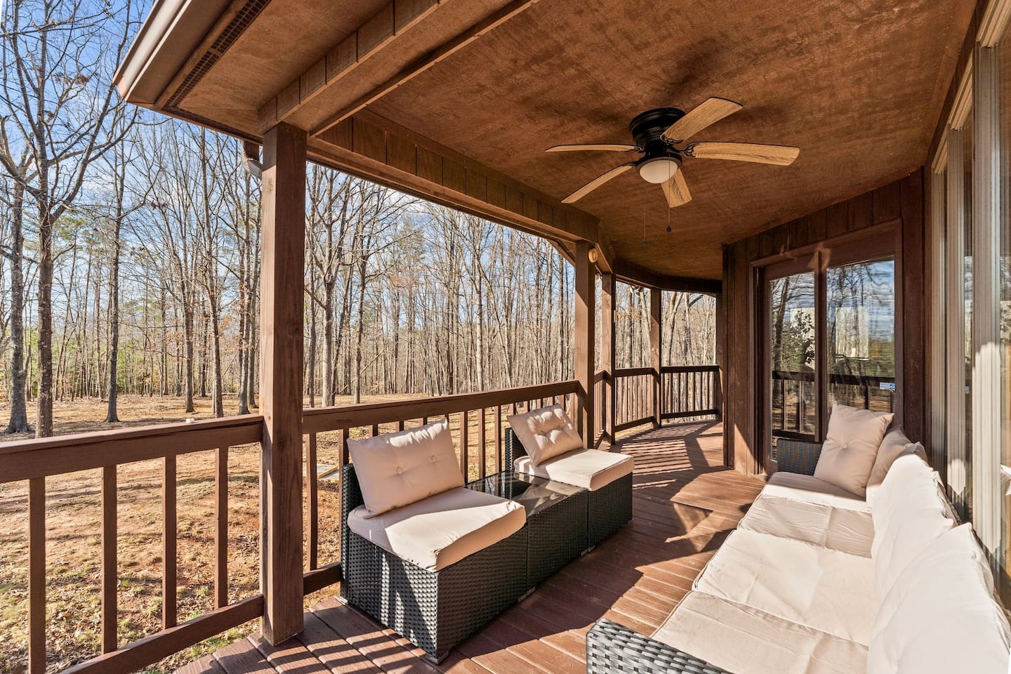 Porch Paradise: Unwind on this spacious deck with nature views and stylish seating!