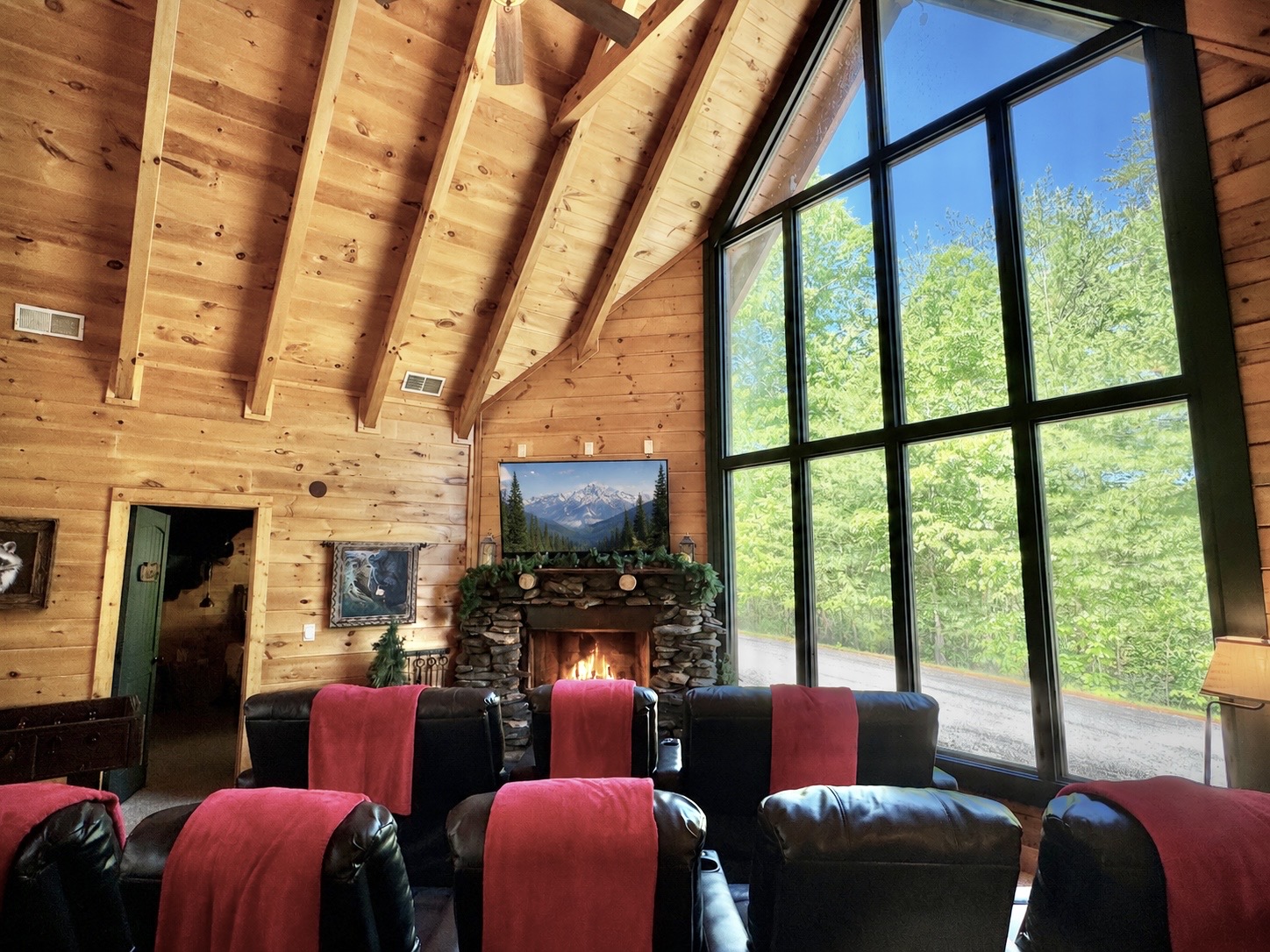 Theater Area, 10 leather recliners and wood burning fireplace.