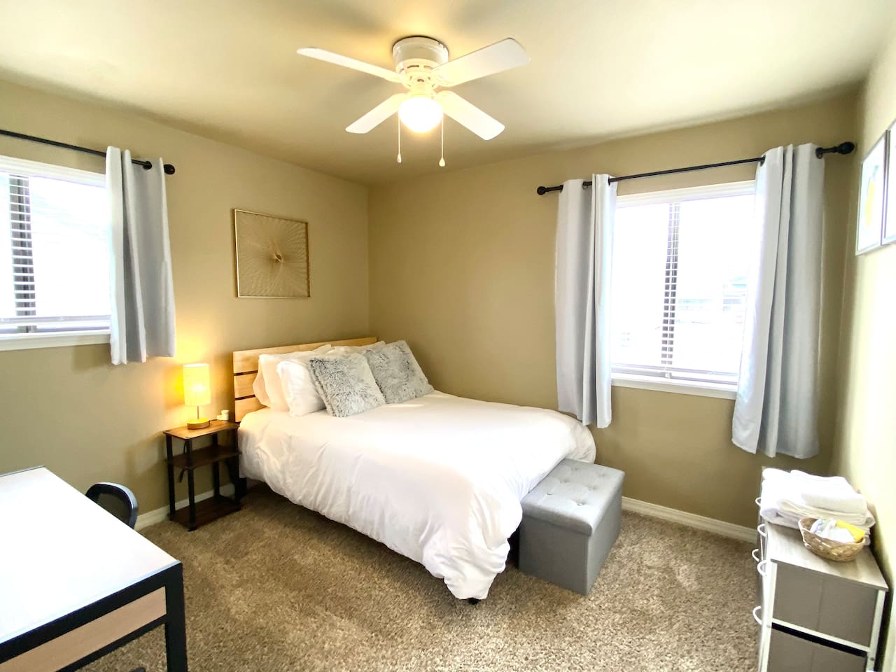 Bedroom with double bed and desk