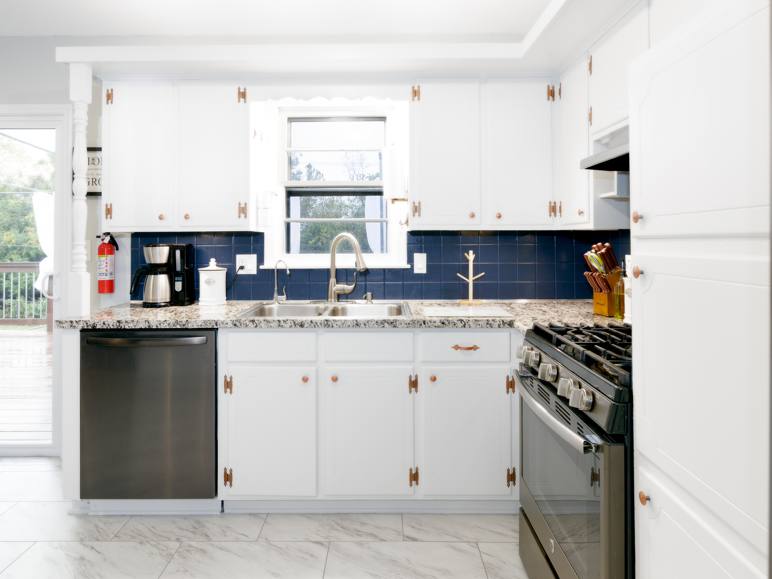 Functional kitchen sink and prep area with ample workspace for meal preparation.