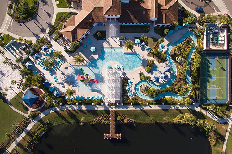 Aerial view of the resort pool and courts