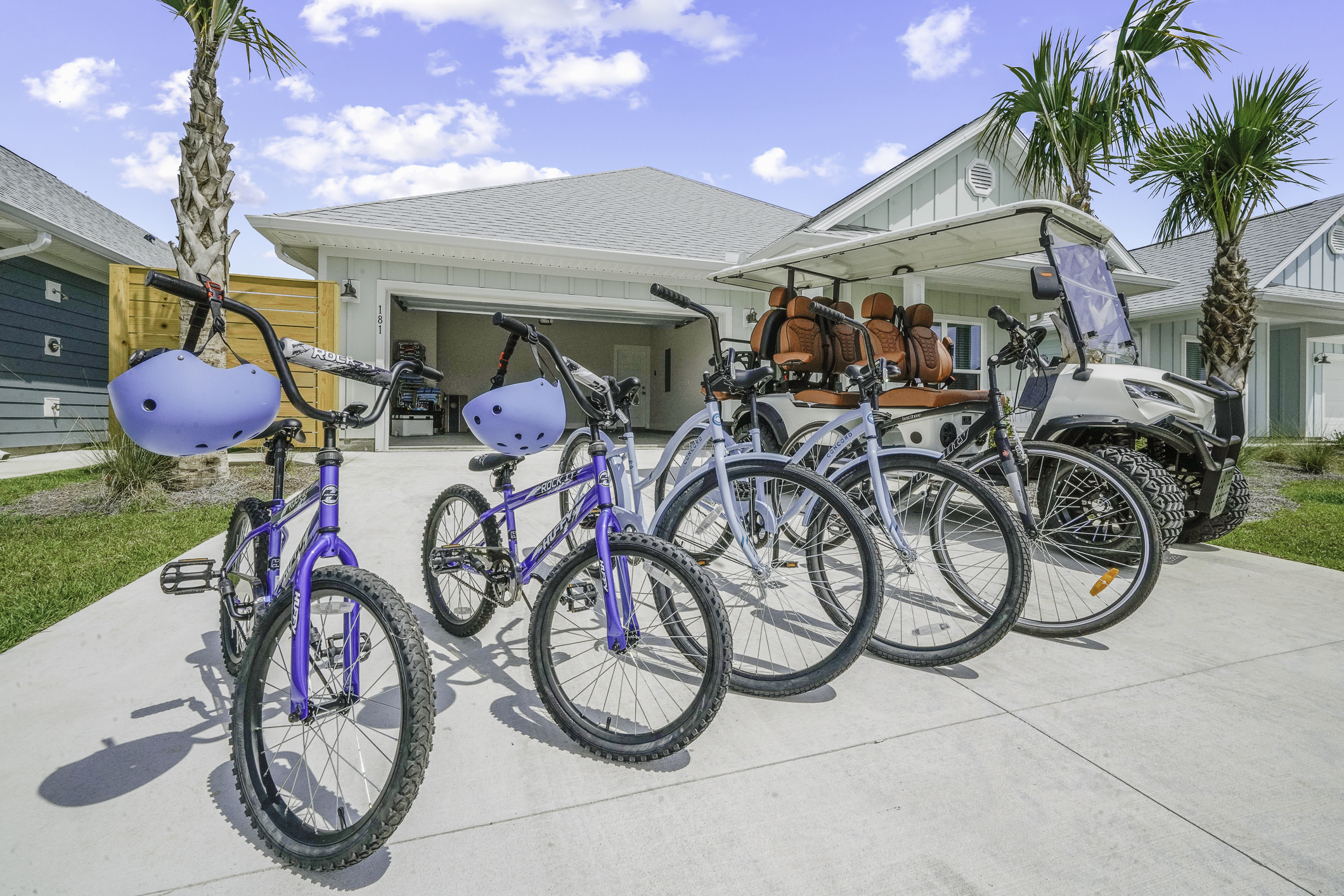 Adventure-ready garage with 6-seater golf cart & Bikes