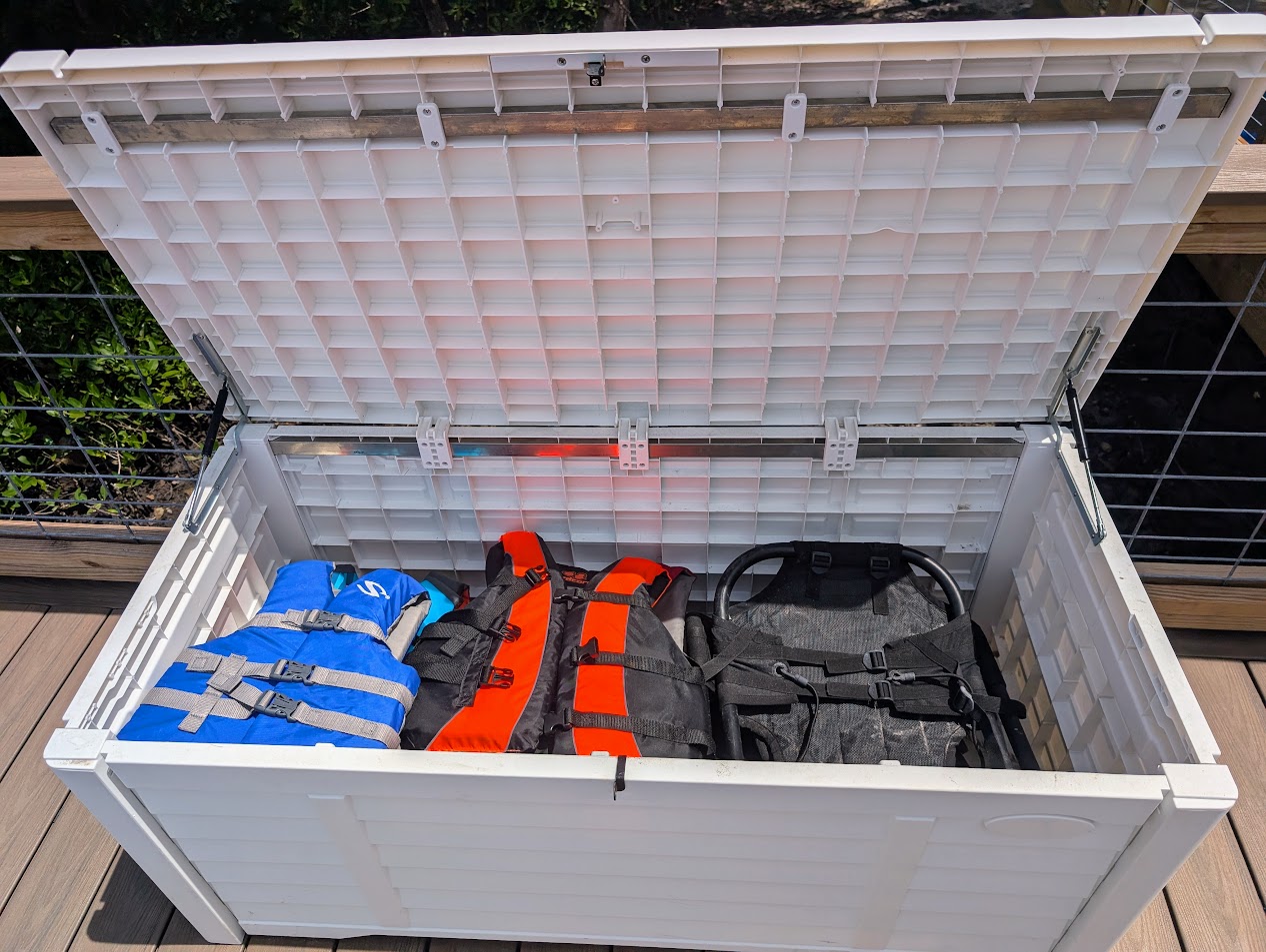 Life jackets and kayak seats located on back deck