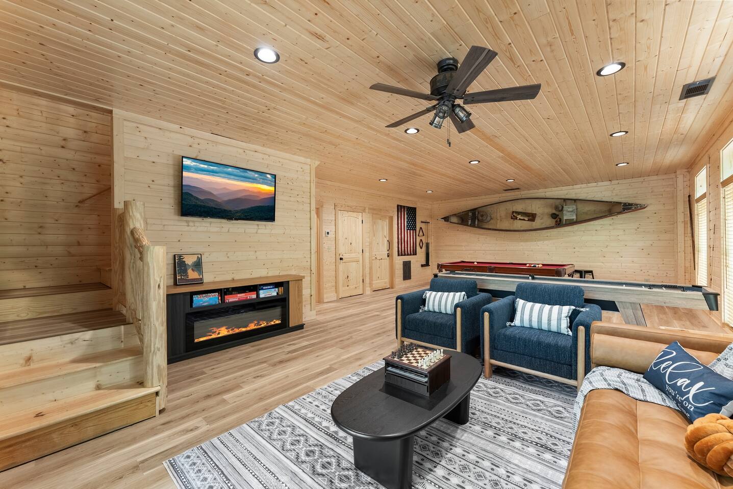 Cozy Game Room with Fireplace & Nautical Charm