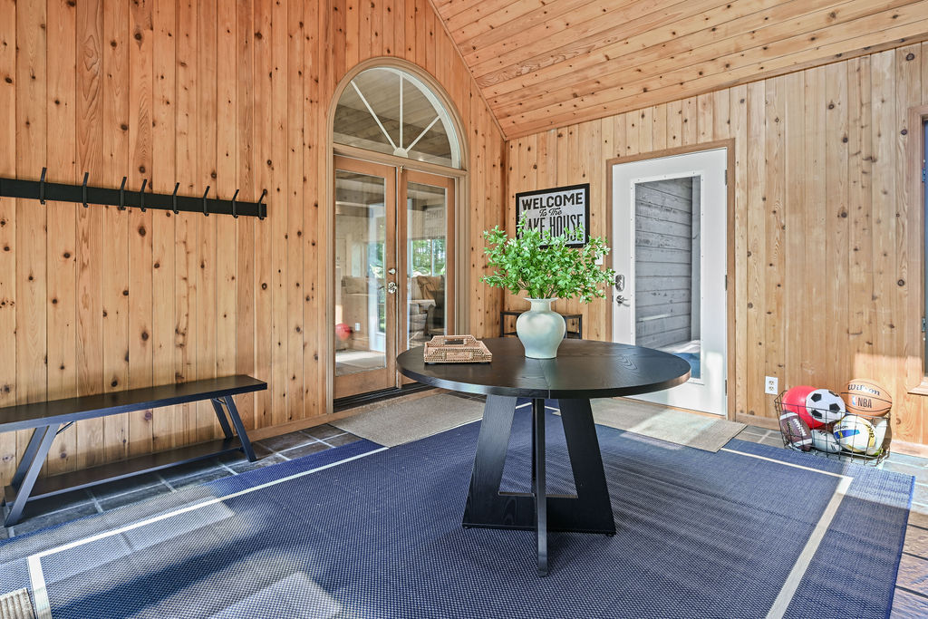 Spacious mudroom for shoes, coats, bags