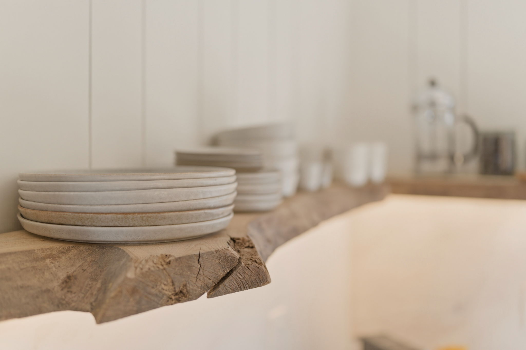 For guests who love the ritual of cooking, even the details matter—curated stoneware, quality essentials, and a kitchen designed to make staying in feel special.