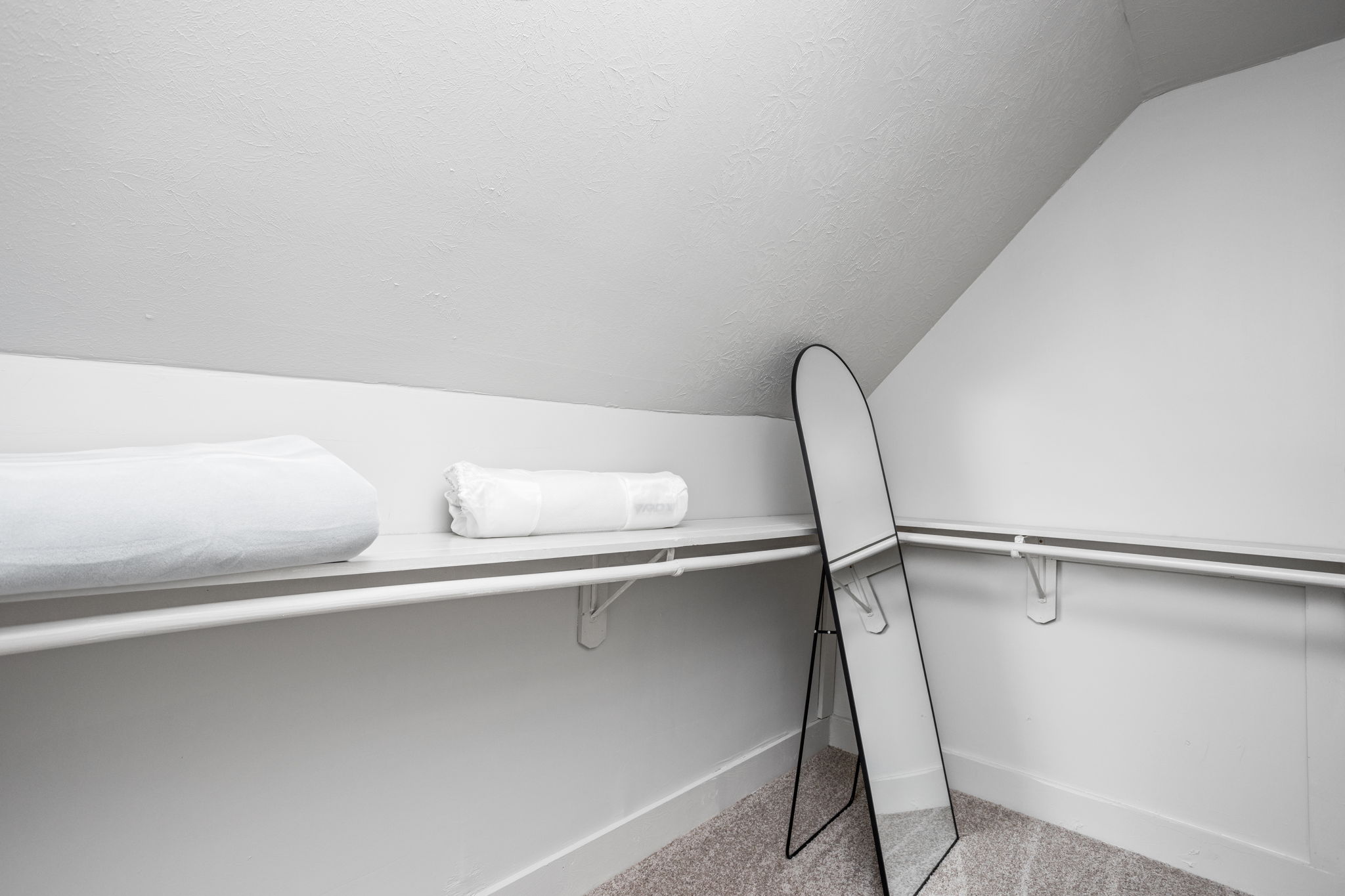 Store your belongings and clothes in the expansive primary bedroom closet.